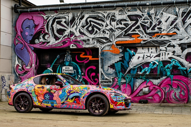 Mazda Dealer Creates A $75K MX-5 That Glows In The Dark With A Giant Godzilla Surprise